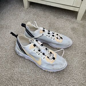 Nike react black gold white sneakers